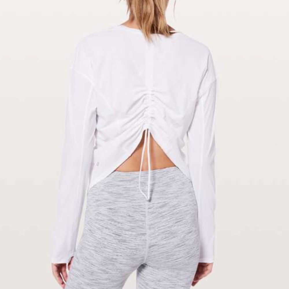 Lululemon on pace  long sleeve top with thumb holes and scruchable back